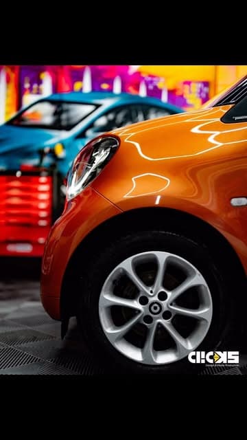 Oranger Smart, Seitenansicht mit glänzender Felge